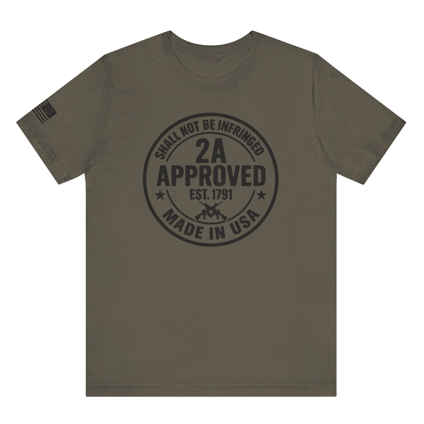 Flat lay of olive green ‘2A Approved – Shall Not Be Infringed’ t-shirt with circular stamp graphic and American flag on the sleeve.