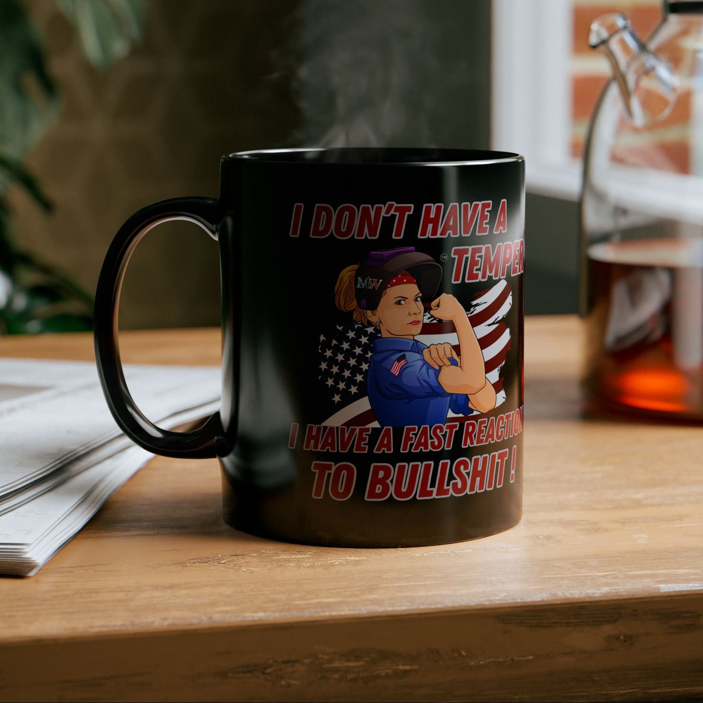 Black 11oz ceramic mug on a wooden table with “Fast Reaction to BS” patriotic design and steam